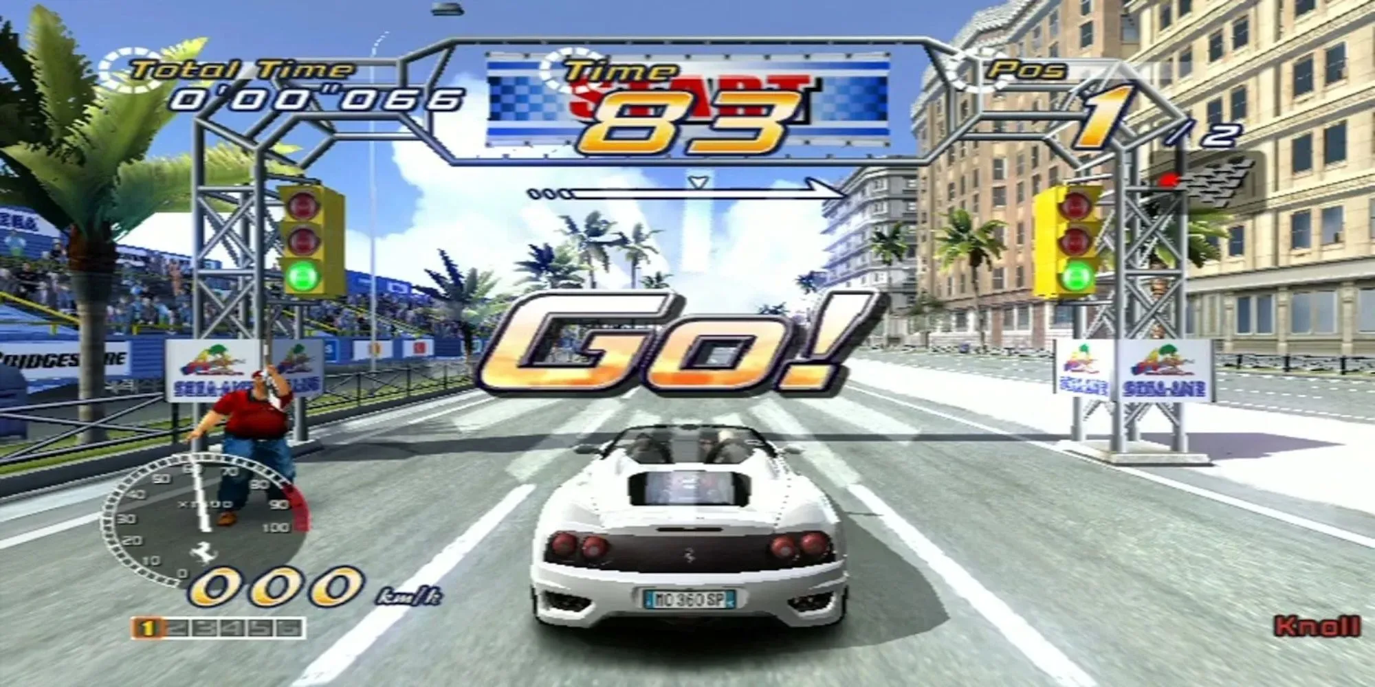 Ảnh chụp màn hình game Outrun 2 với chiếc Ferrari Testarossa đỏ và cảnh biển tuyệt đẹp