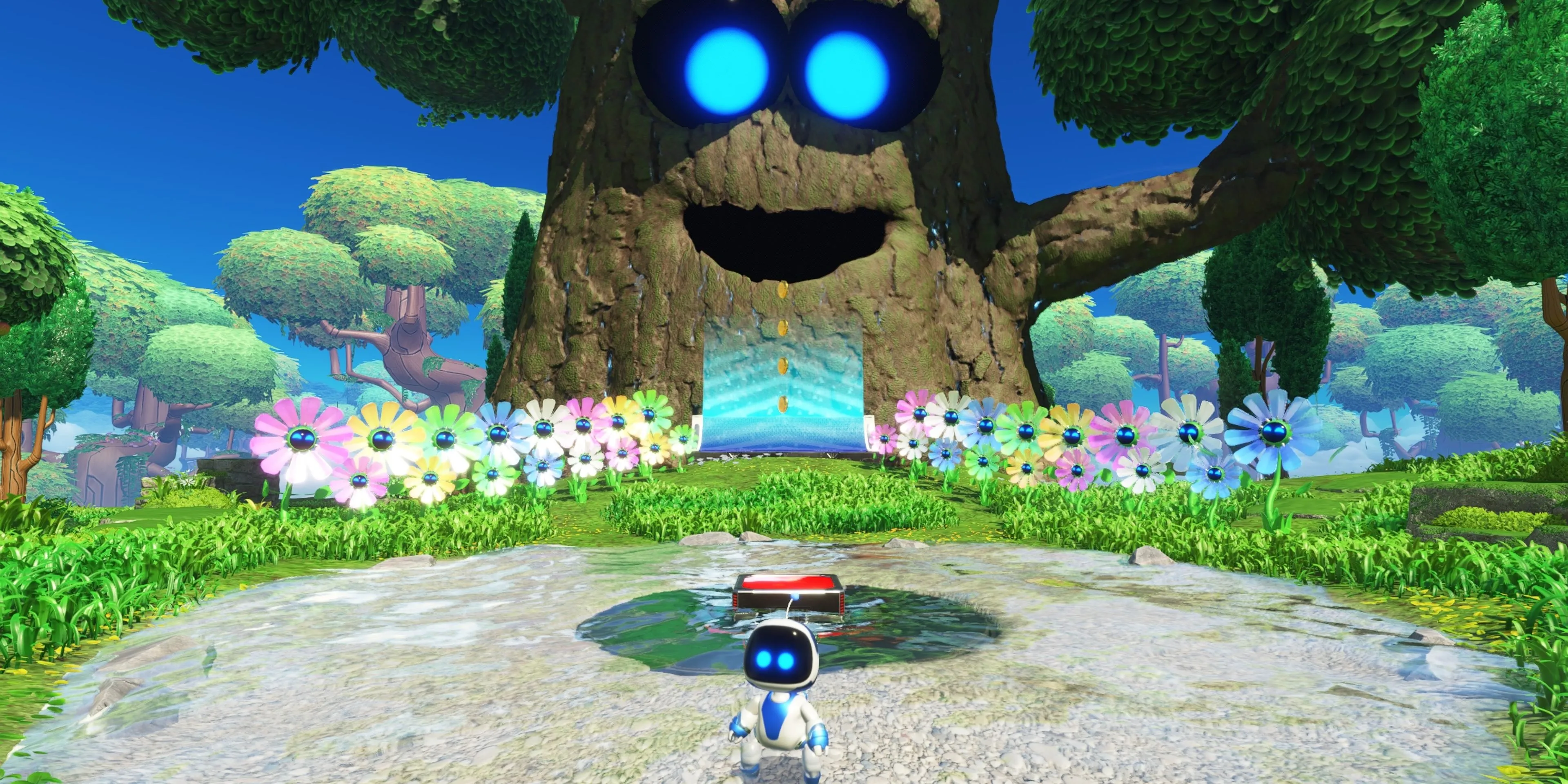 Astro Bot tạo dáng bên cạnh một cái cây kỳ lạ trong game