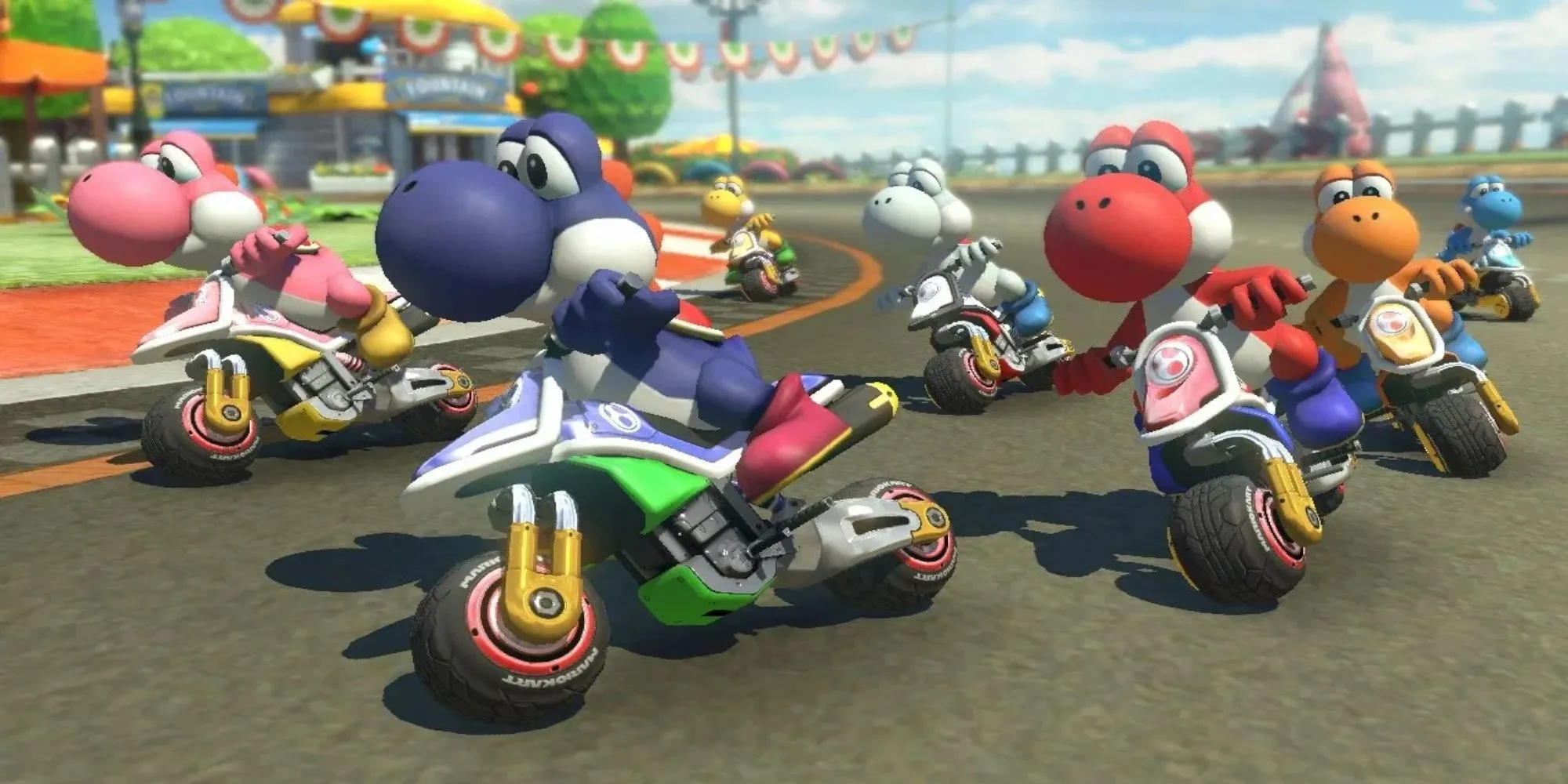 Các nhân vật Mario Kart 8 đang đua trên một đường đua đầy màu sắc