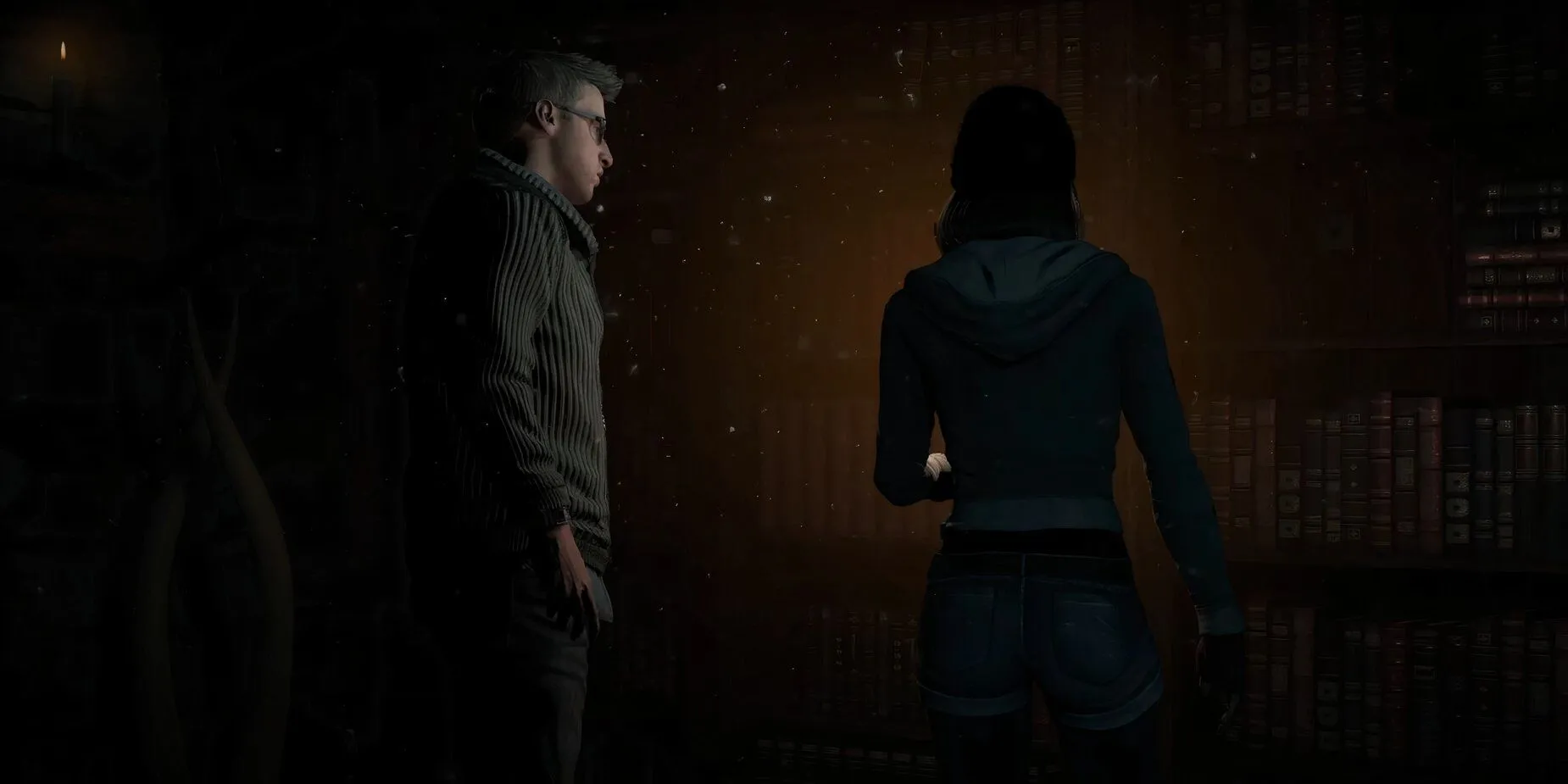 Các nhân vật trong Until Dawn đang tương tác gần tủ sách trong một cảnh game.