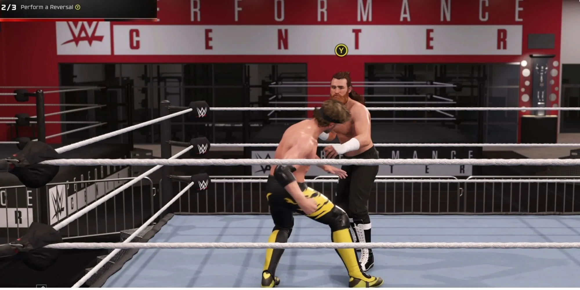 Đô vật đang thực hiện một pha phản đòn trong game WWE 2K25