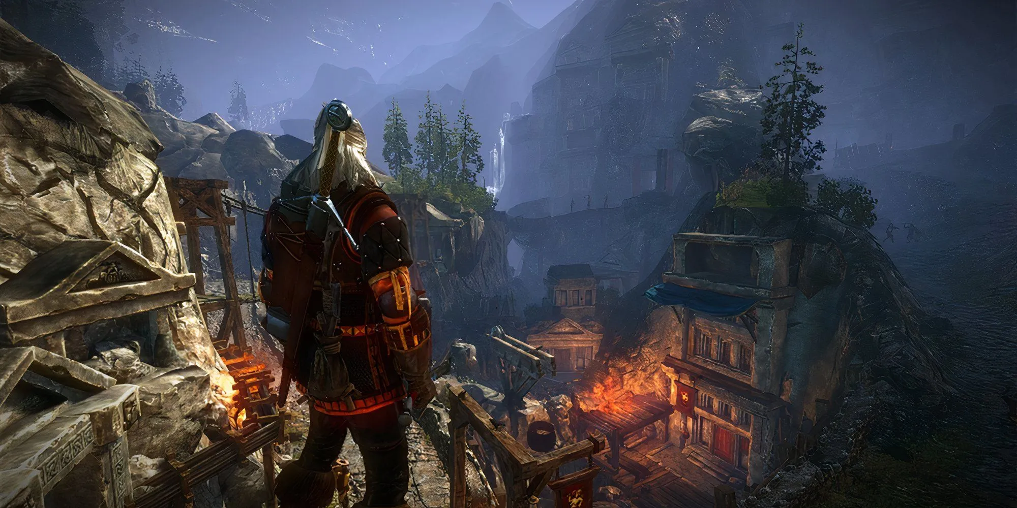 Geralt nhìn xuống một thị trấn từ trên cao trong The Witcher 2 Assassins of Kings