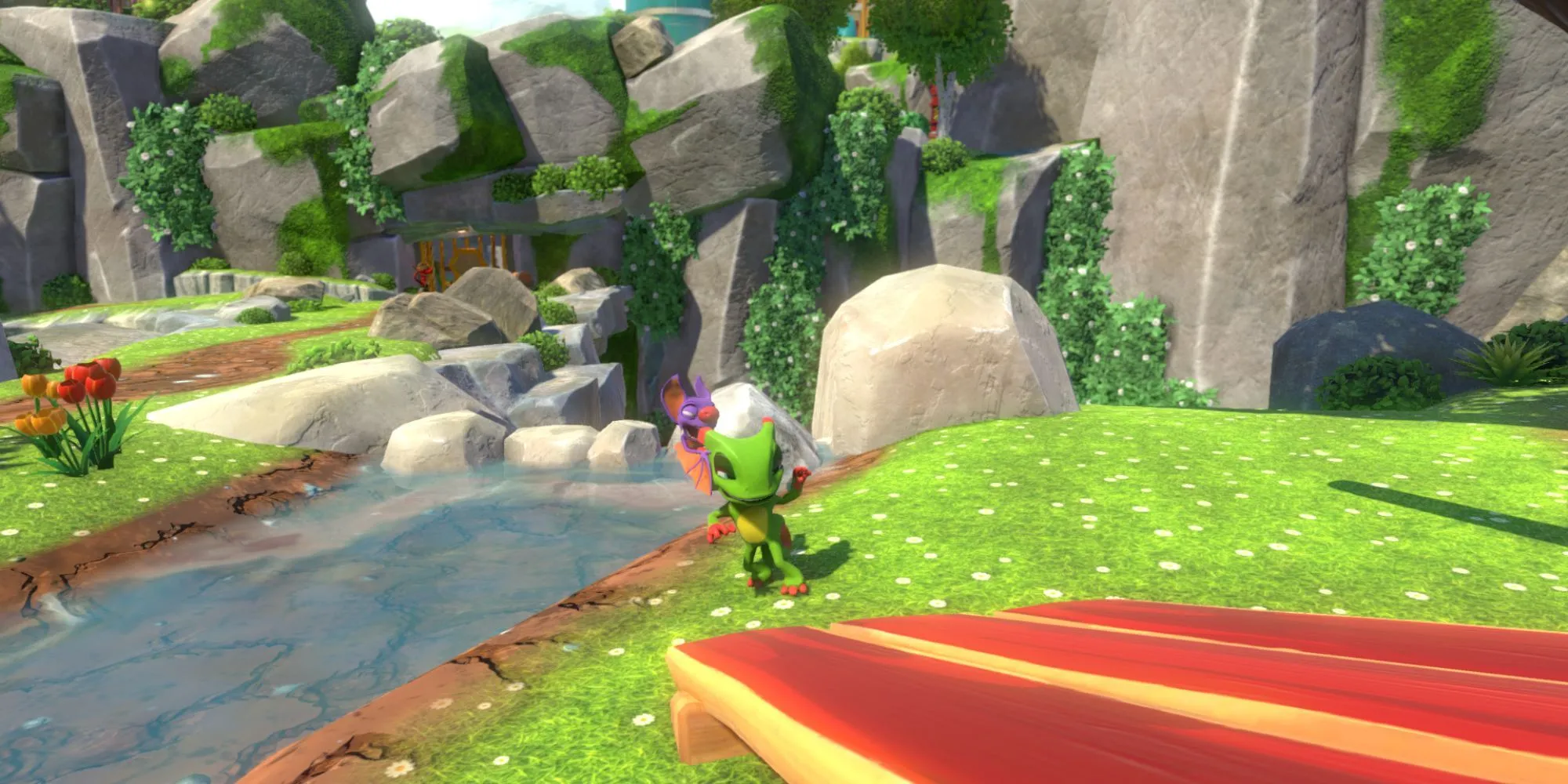 Hai nhân vật Yooka và Laylee đứng cạnh một dòng sông trong game Yooka-Laylee