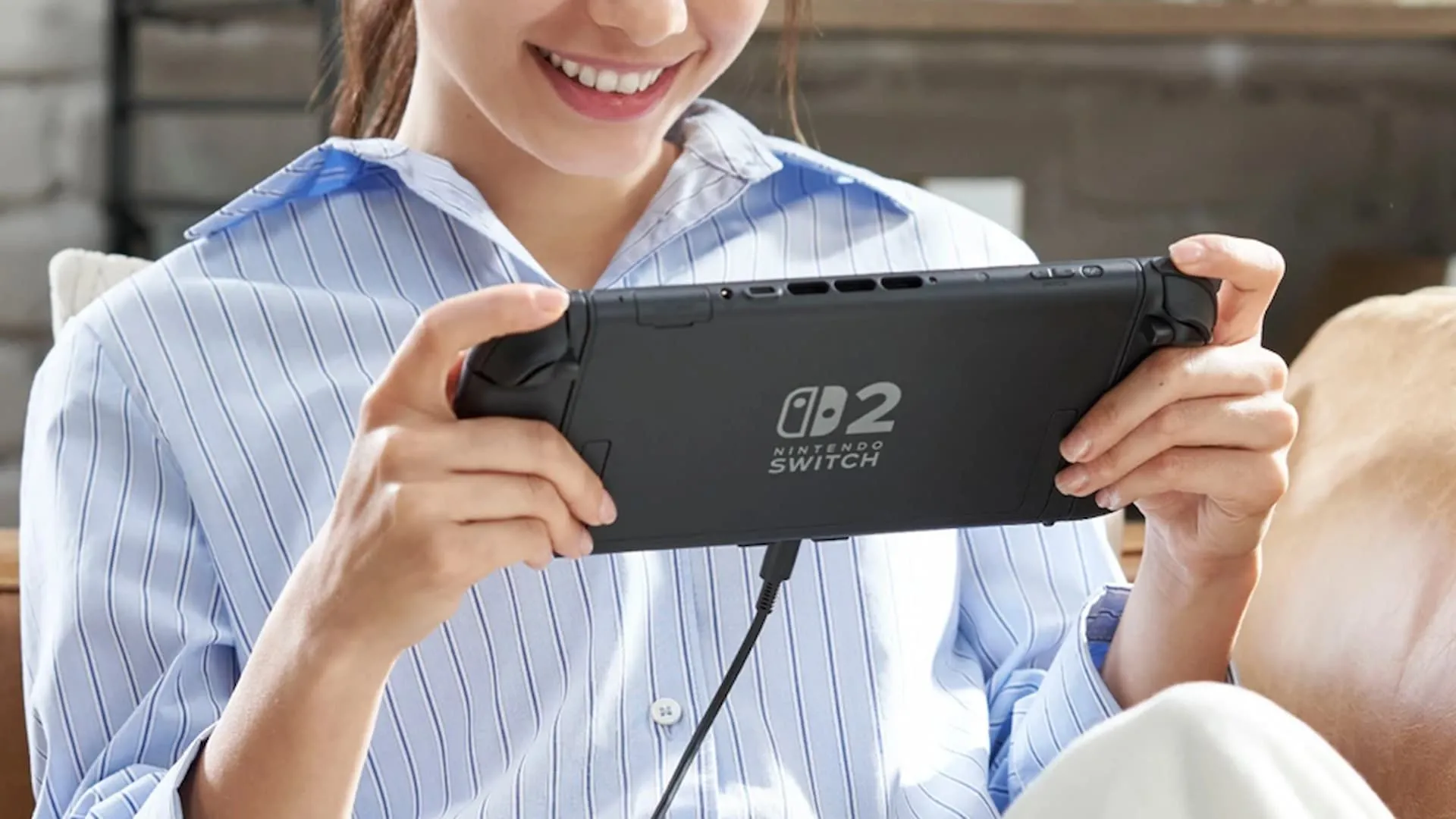 Hình ảnh concept máy Nintendo Switch 2 được một người cầm trên tay, gợi ý về tương lai chơi game di động