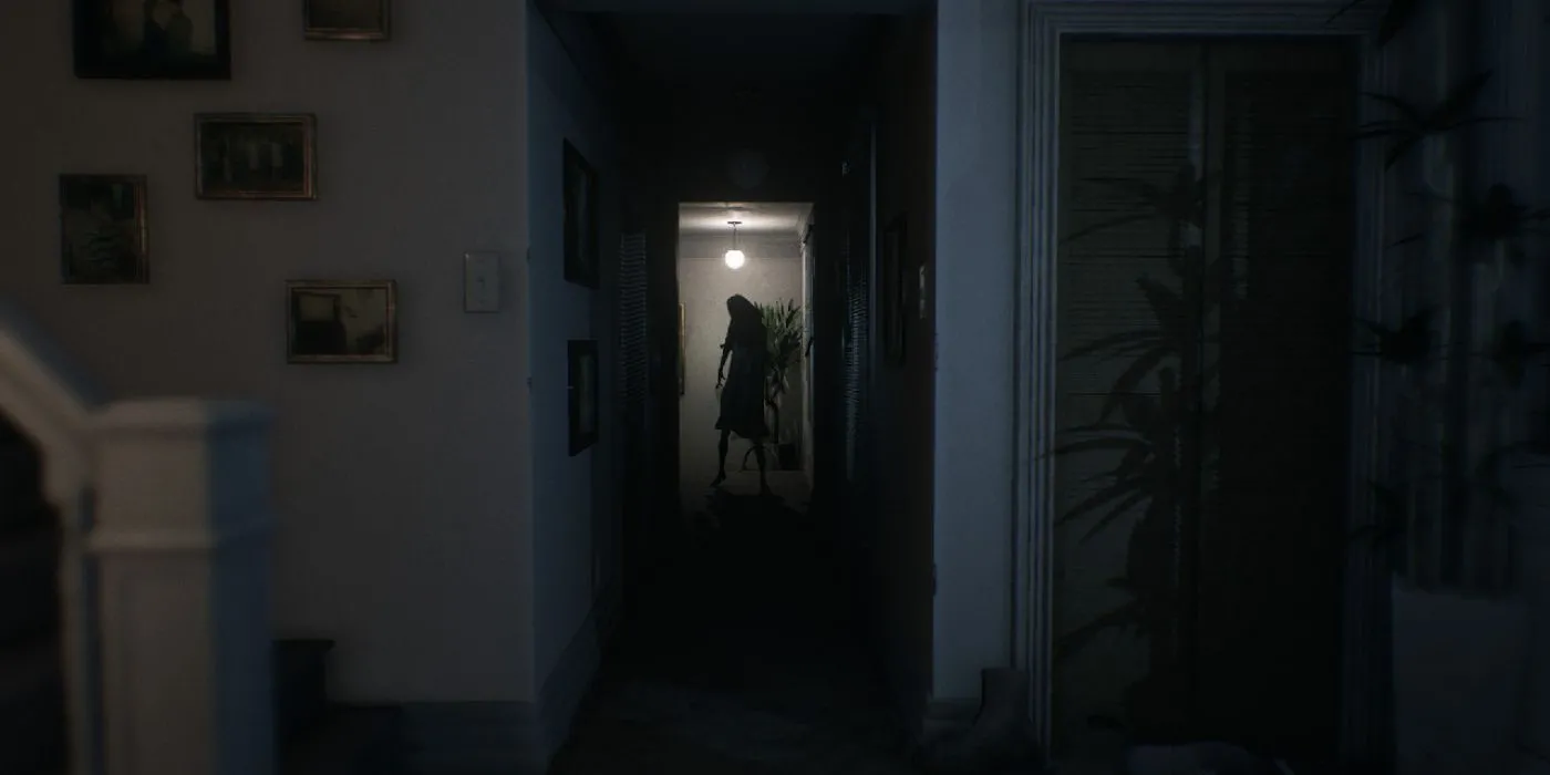 Một bóng đen bí ẩn trong hành lang tối tăm của game Visage, gợi nhớ đến P.T.