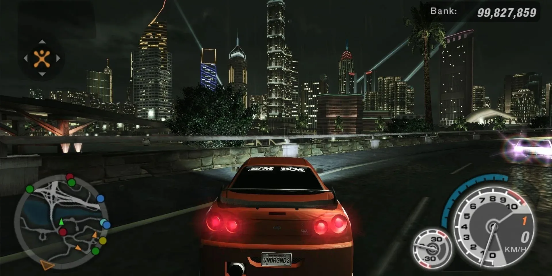 Need For Speed Underground 2 PS2 với chiếc Nissan Skyline trên đường cao tốc ban đêm