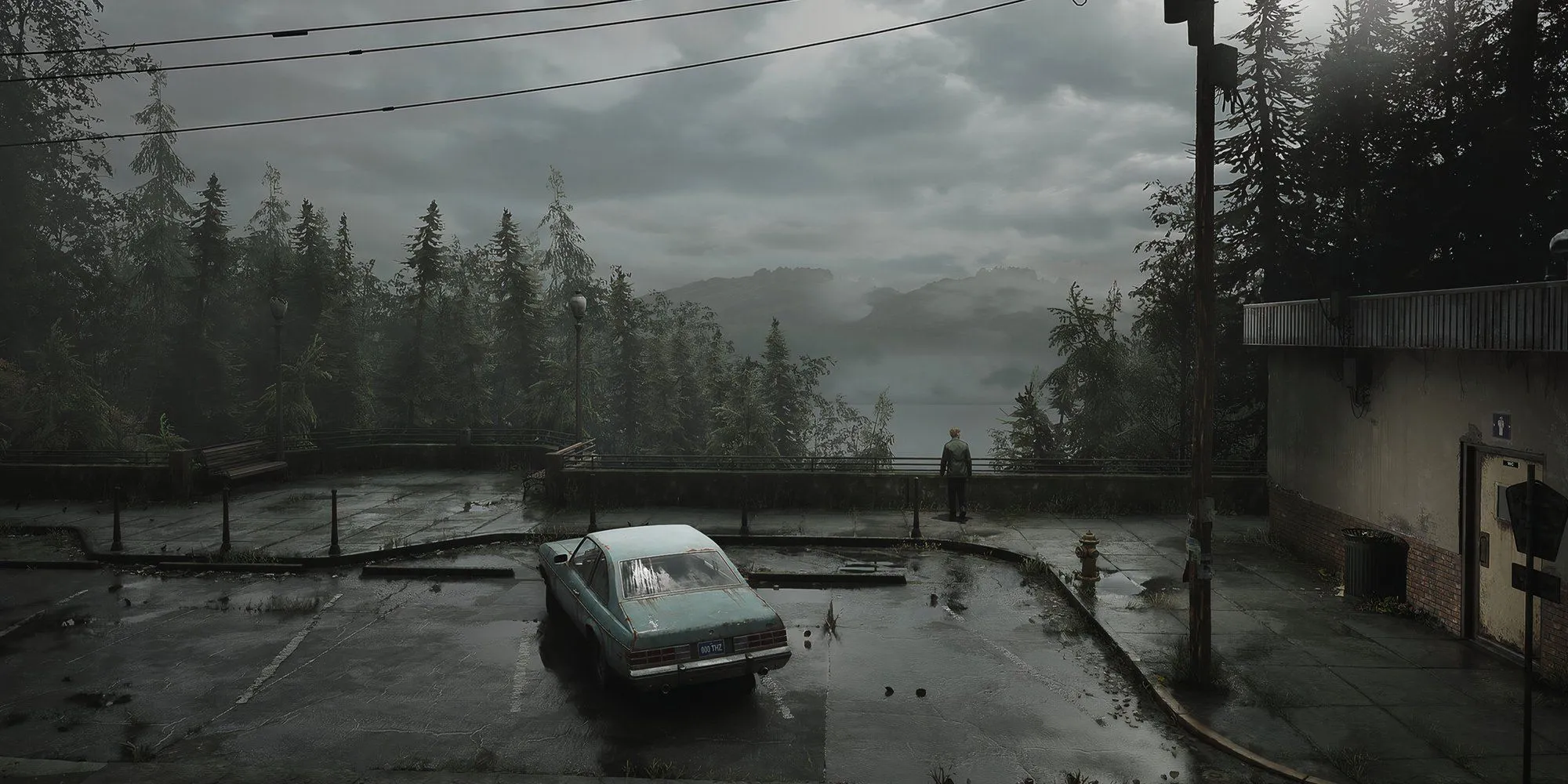 Nhân vật chính James Sunderland của Silent Hill 2 quay lưng và đứng một mình bên ngoài