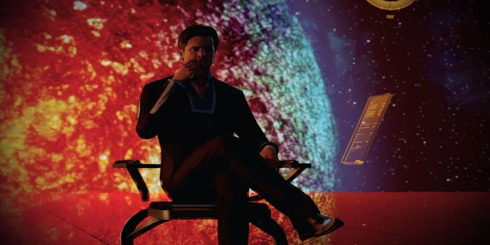 Nhân vật The Illusive Man ngồi trong văn phòng trong series Mass Effect