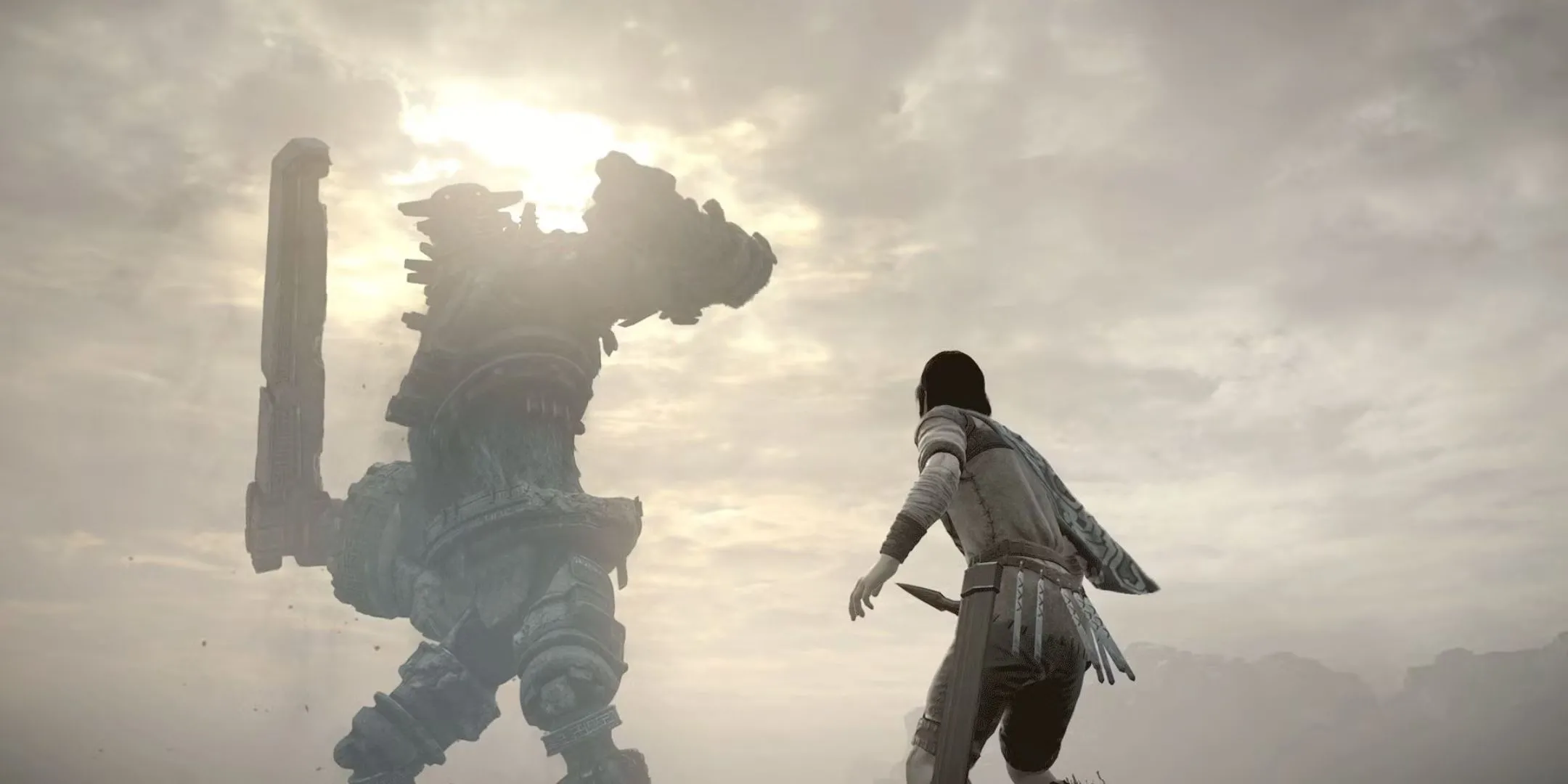 Nhân vật Wander đối mặt với một Colossus khổng lồ trong Shadow of the Colossus