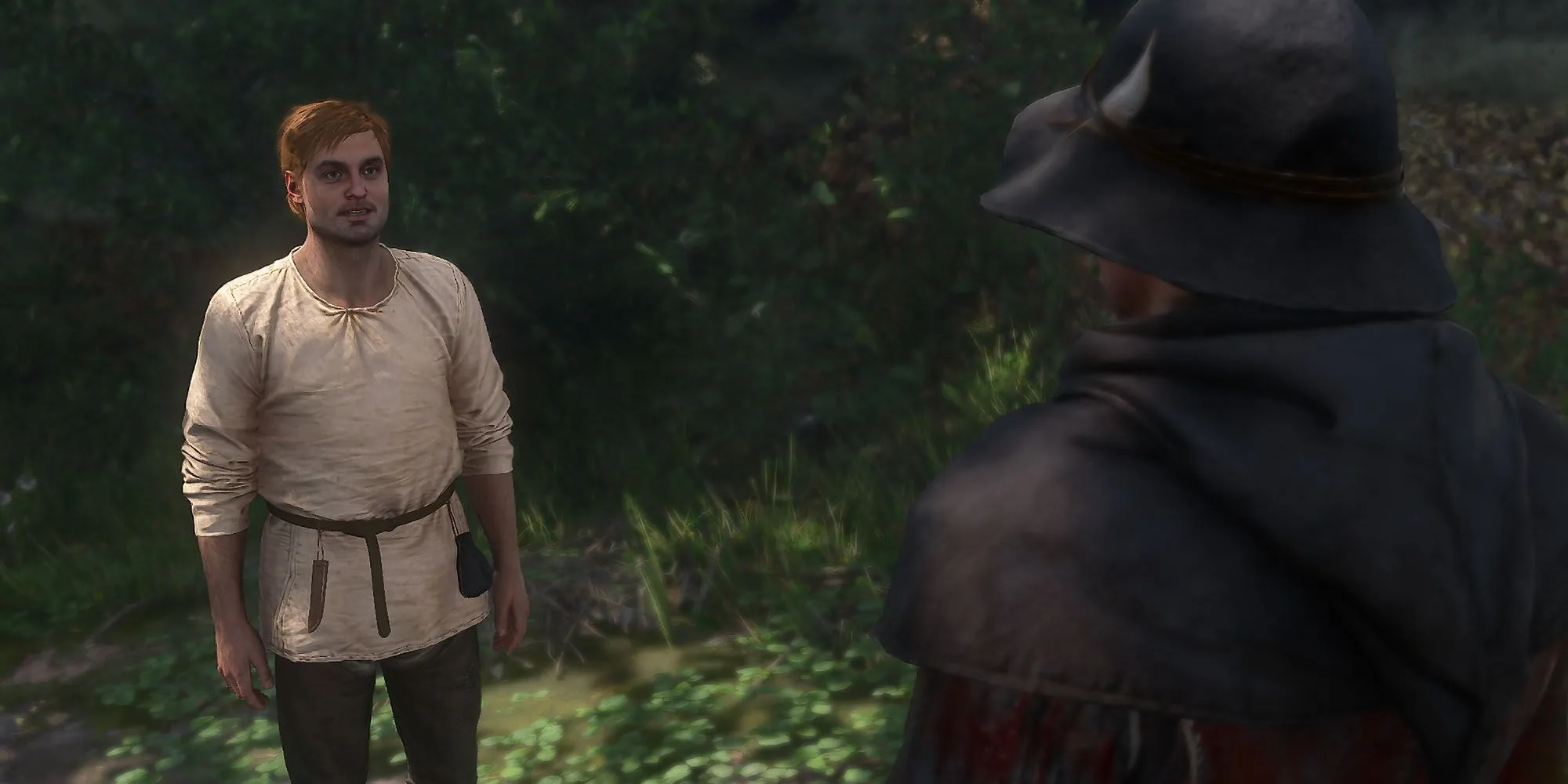 Nhân vật Zinek đứng trên đường nói chuyện với Henry trong Kingdom Come Deliverance 2