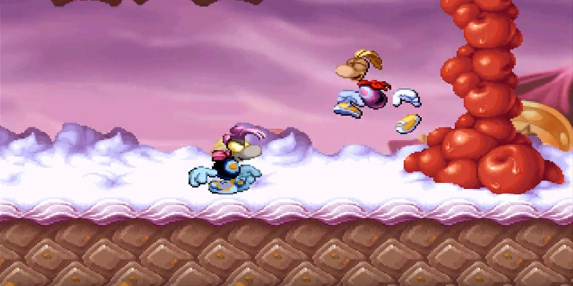Rayman nhảy qua chướng ngại vật trong màn chơi Lâu Đài Kẹo đầy màu sắc của game Rayman cổ điển