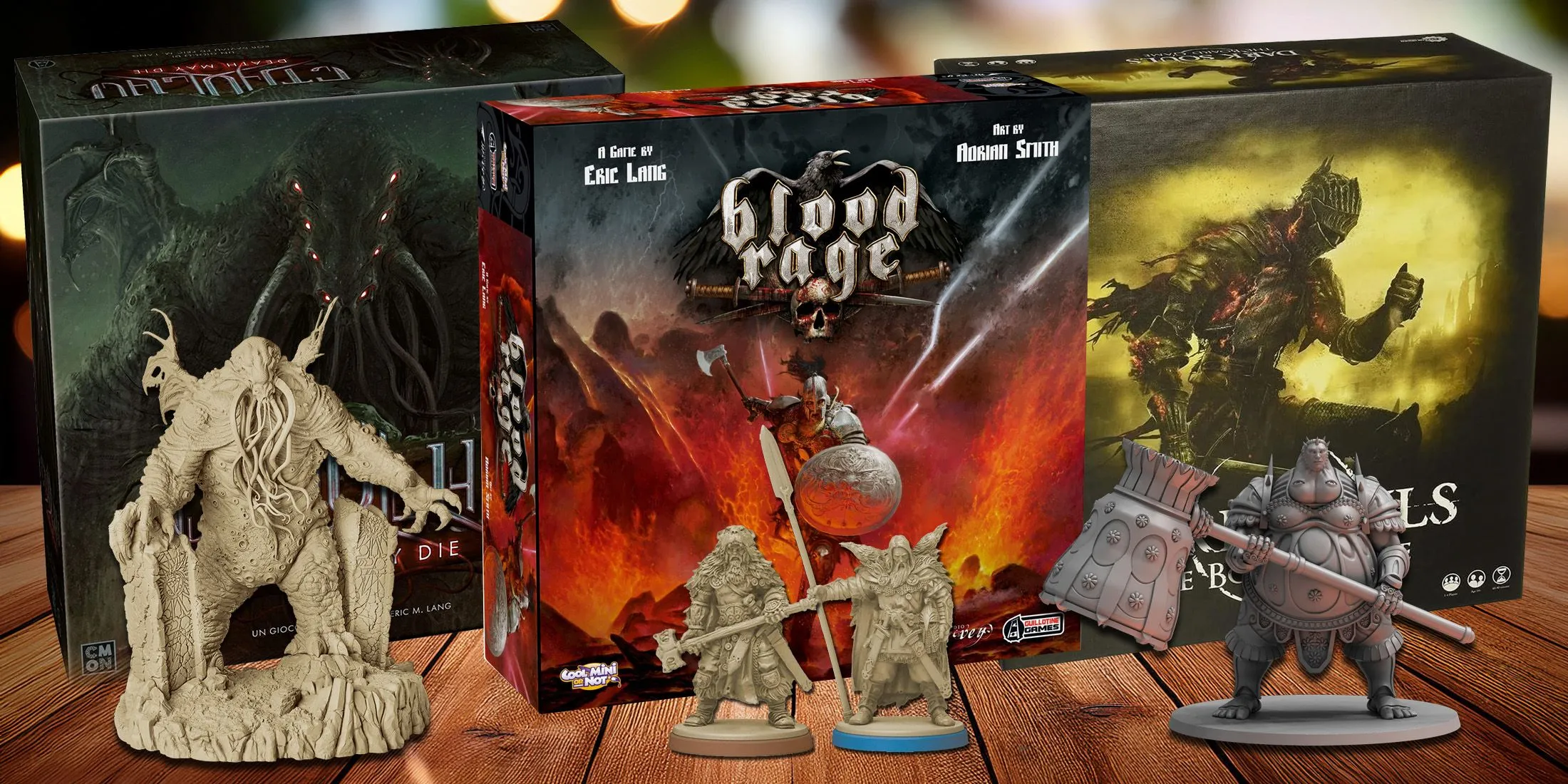 Ba hộp board game nổi tiếng: Cthulhu: Death May Die, Dark Souls Board Game và Blood Rage, đặt trên bàn gỗ.