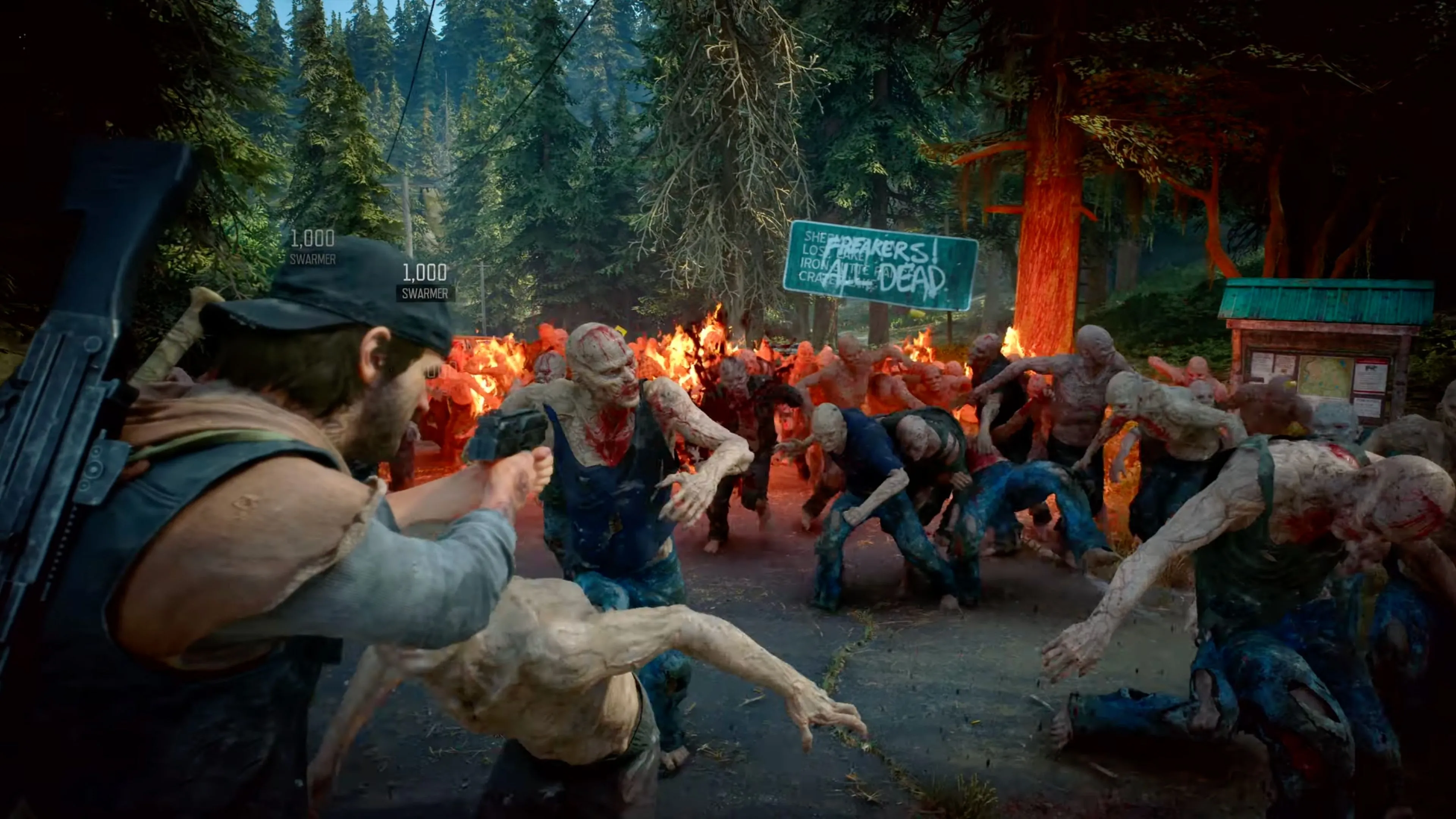 Deacon St. John đối mặt với đàn Freaker khổng lồ trong Days Gone Remastered, thể hiện sự khốc liệt của cơ chế sinh tồn