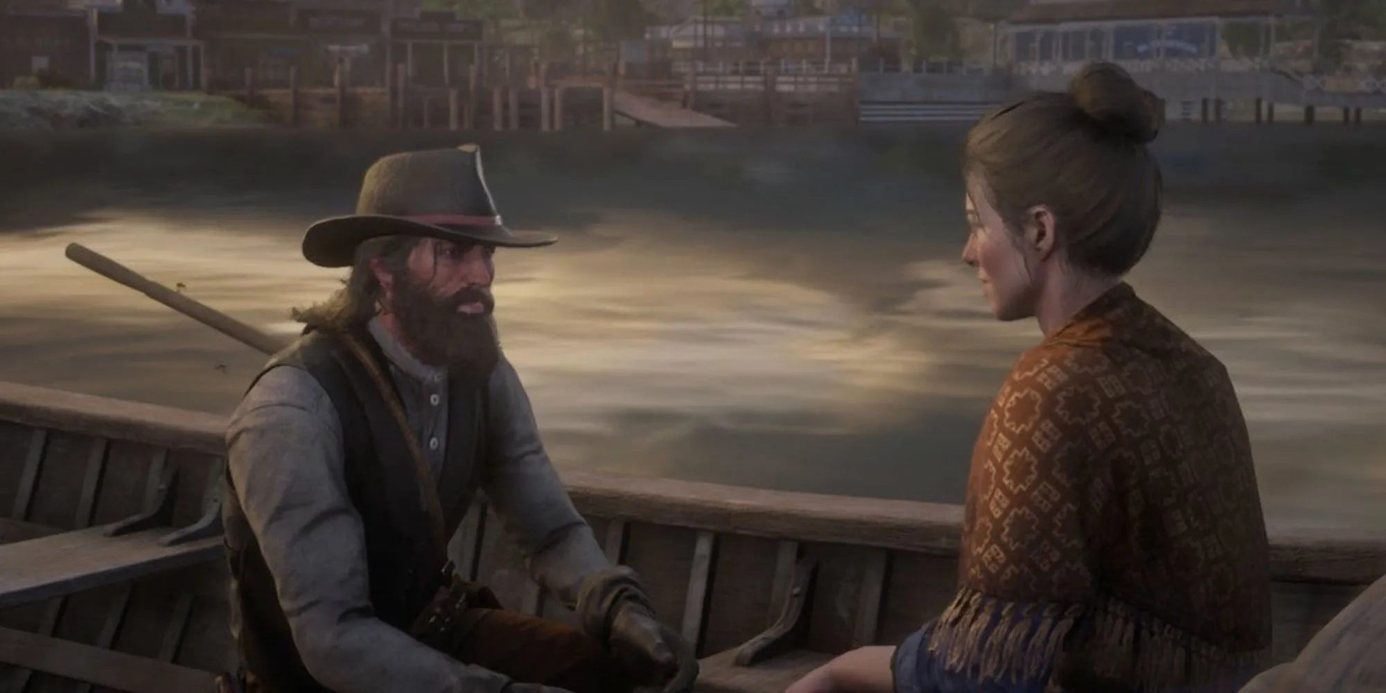 John Marston cầu hôn Abigail trên chiếc thuyền nhỏ, một khoảnh khắc lãng mạn hiếm hoi giữa cuộc đời đầy biến động của họ trong Red Dead Redemption 2.