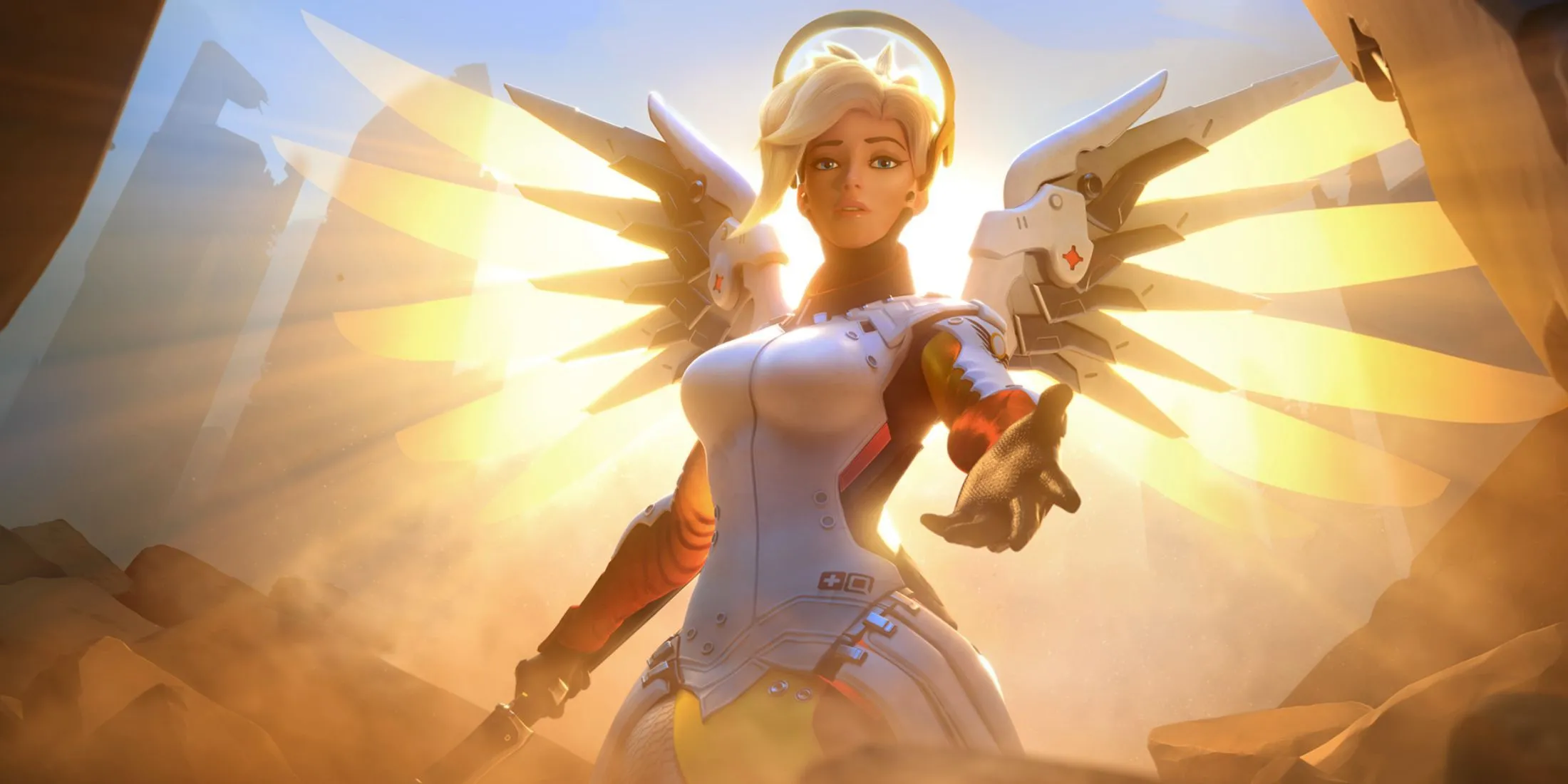 Mercy trong Overwatch 2 sử dụng cây trượng Caduceus của mình để buff sát thương cho đồng đội, thể hiện vai trò hỗ trợ đắc lực và sự linh hoạt trong giao tranh.