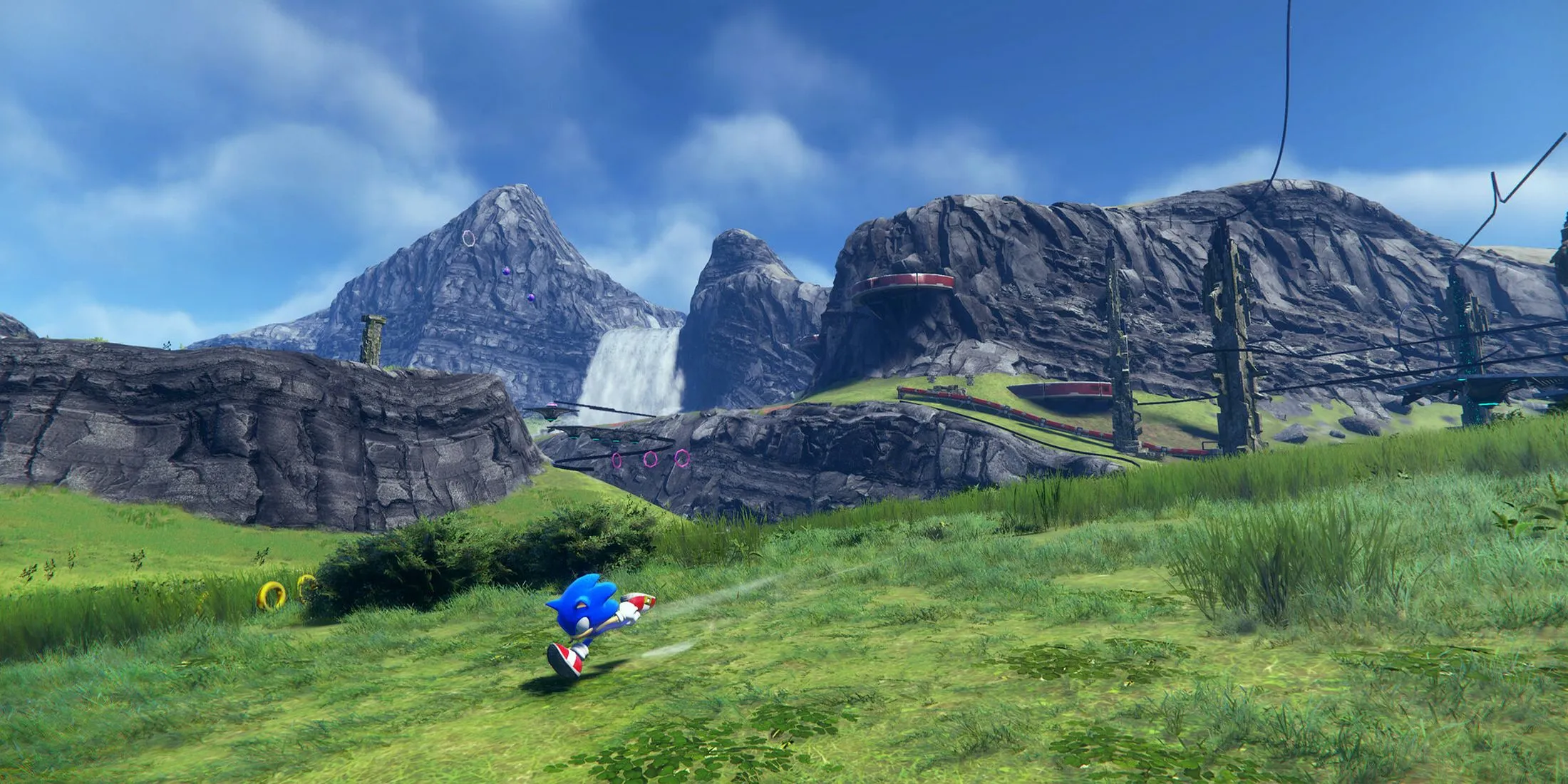 Sonic đang chạy nước rút qua một cánh đồng rộng lớn trong game Sonic Frontiers, thể hiện quy mô thế giới mở
