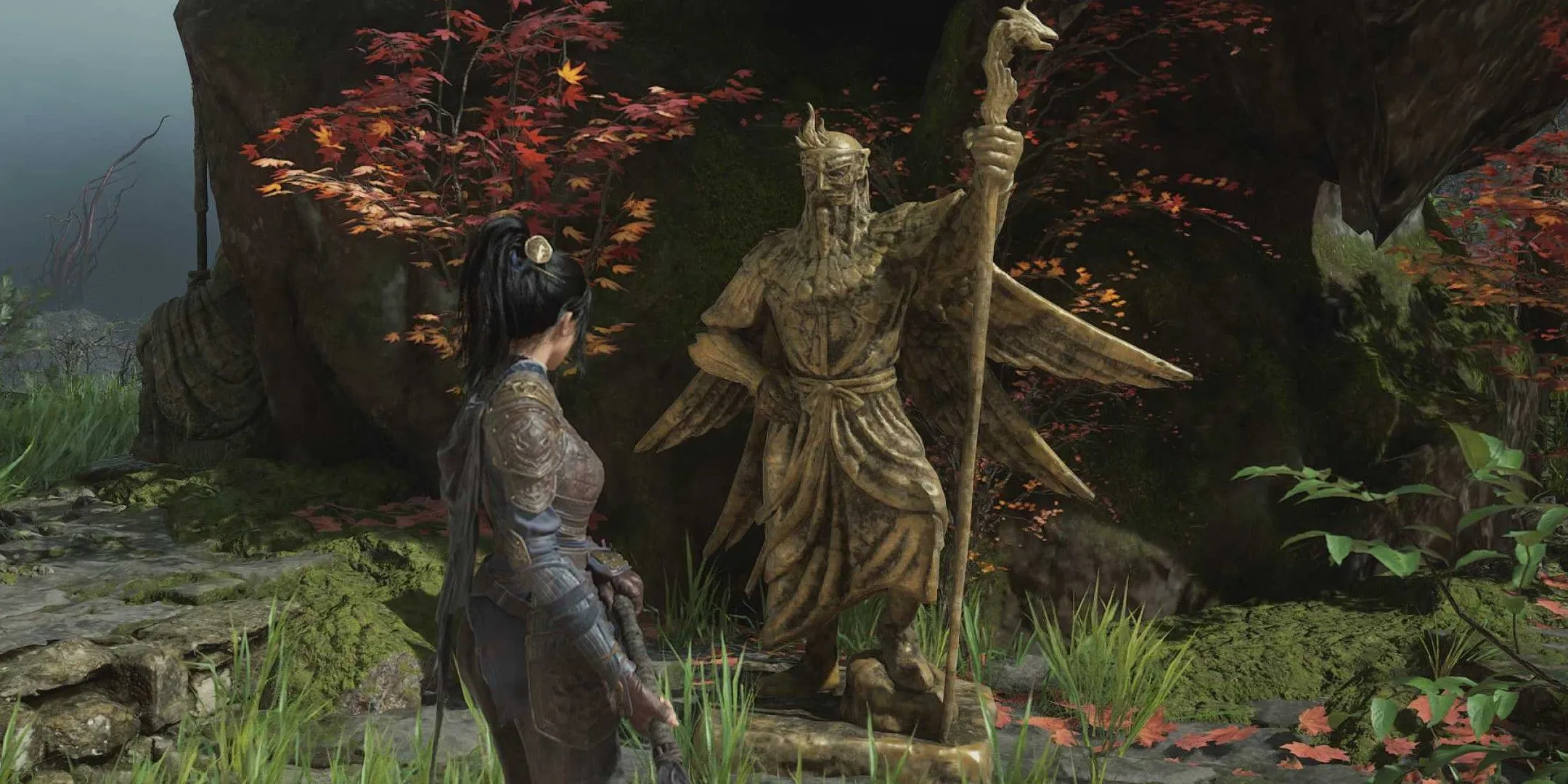 Wuchang đứng trước một bức tượng vàng lộng lẫy tại Shu Sanctum, nơi có thể thanh tẩy Madness