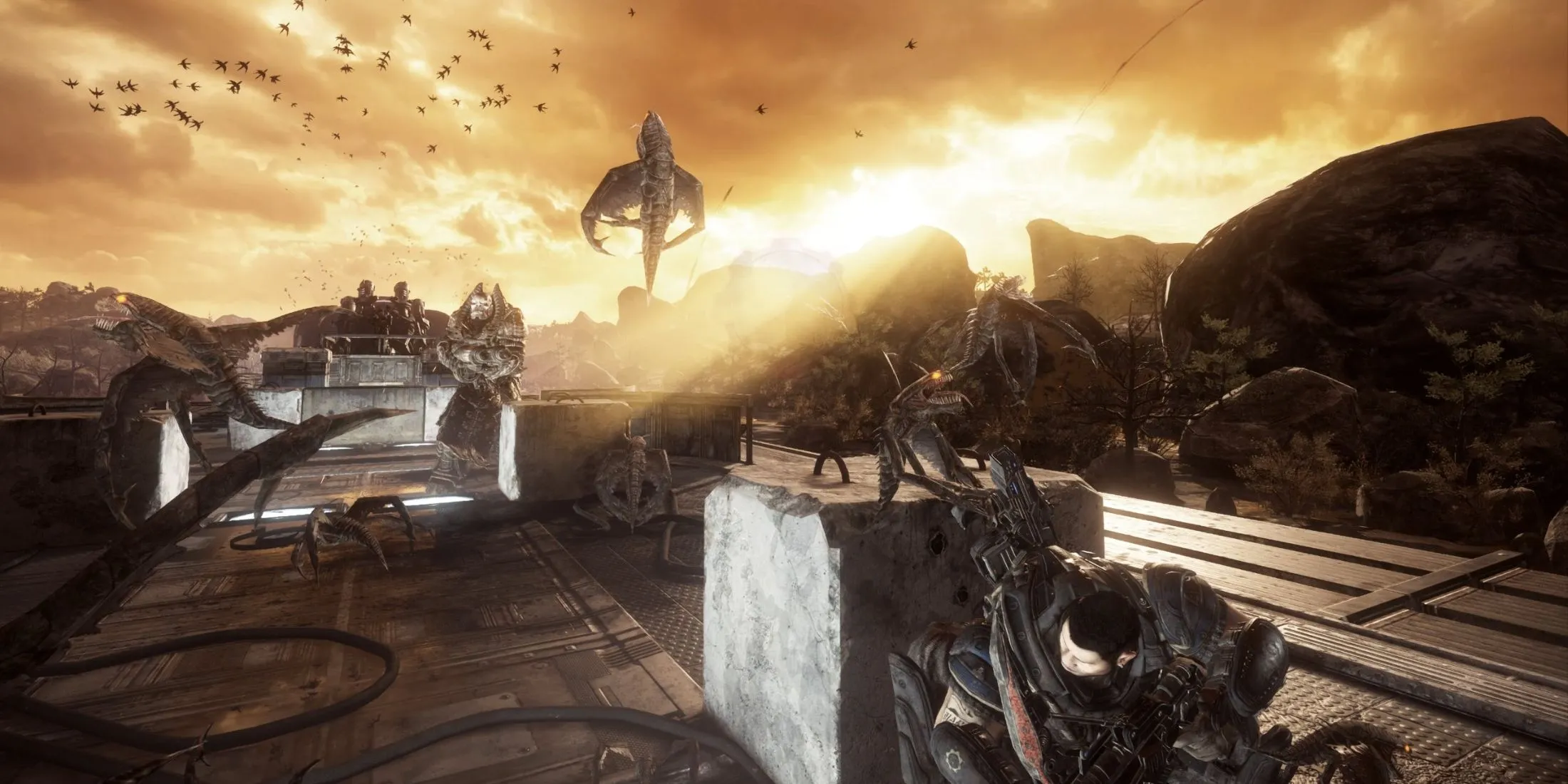 Người chơi điều khiển tháp pháo trong trận chiến Boss Raam của Gears of War Reloaded, thể hiện gameplay hành động khốc liệt